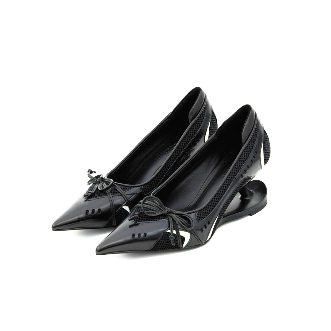 black sculptural heel pumps modern design