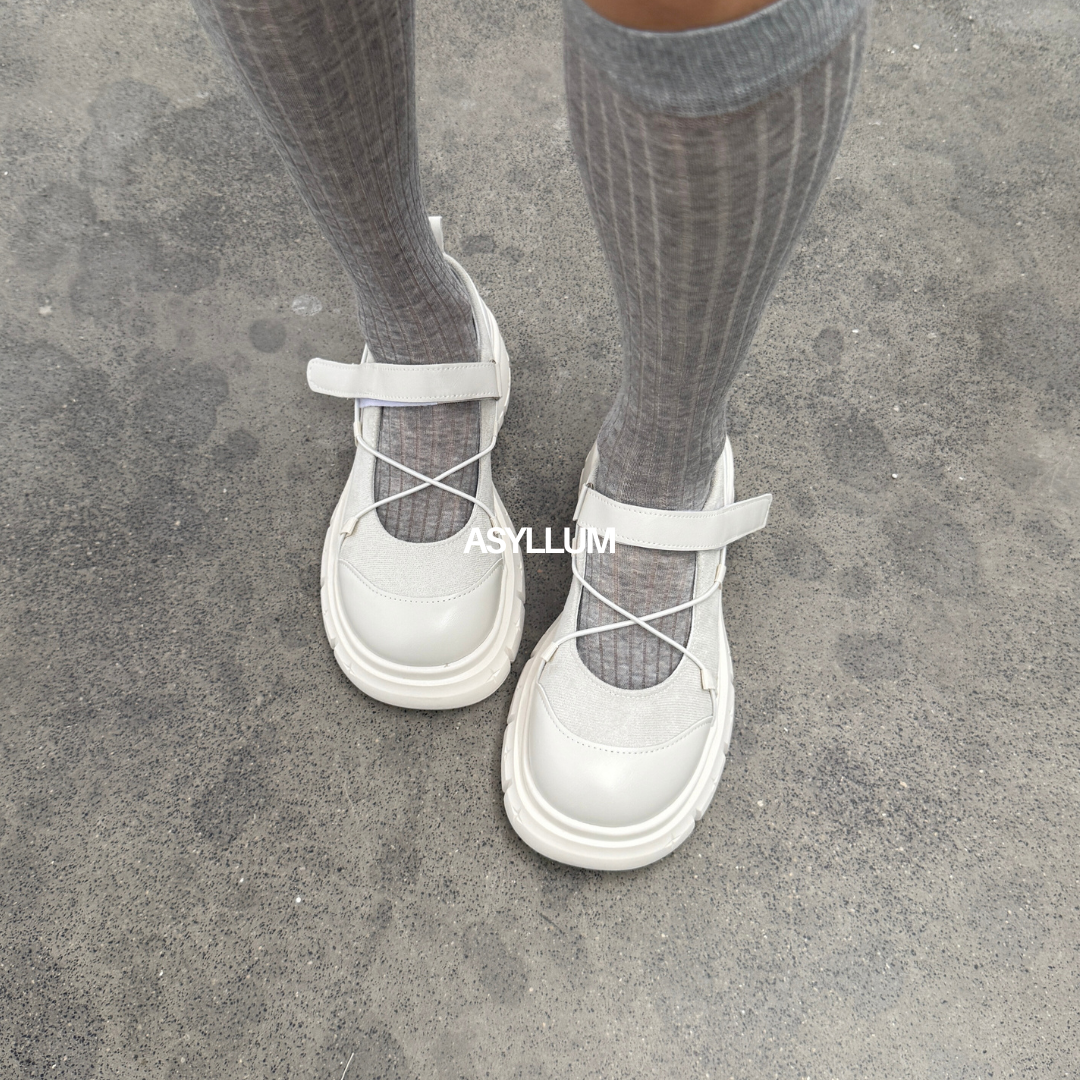 white mary jane sneakers front view on feet